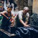 Cotton skeins are dunked in black ink
